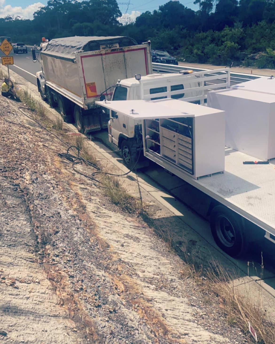 C & D service truck attending a roadside truck breakdown