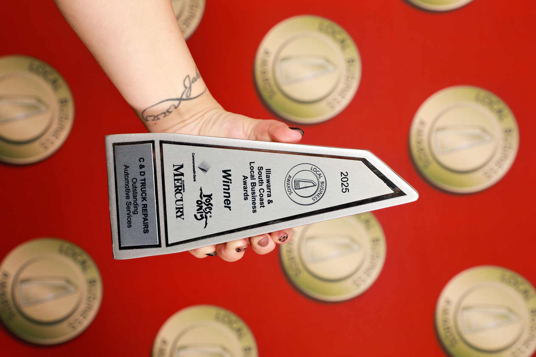 2025 Local Business Awards trophy — Outstanding Automotive Services